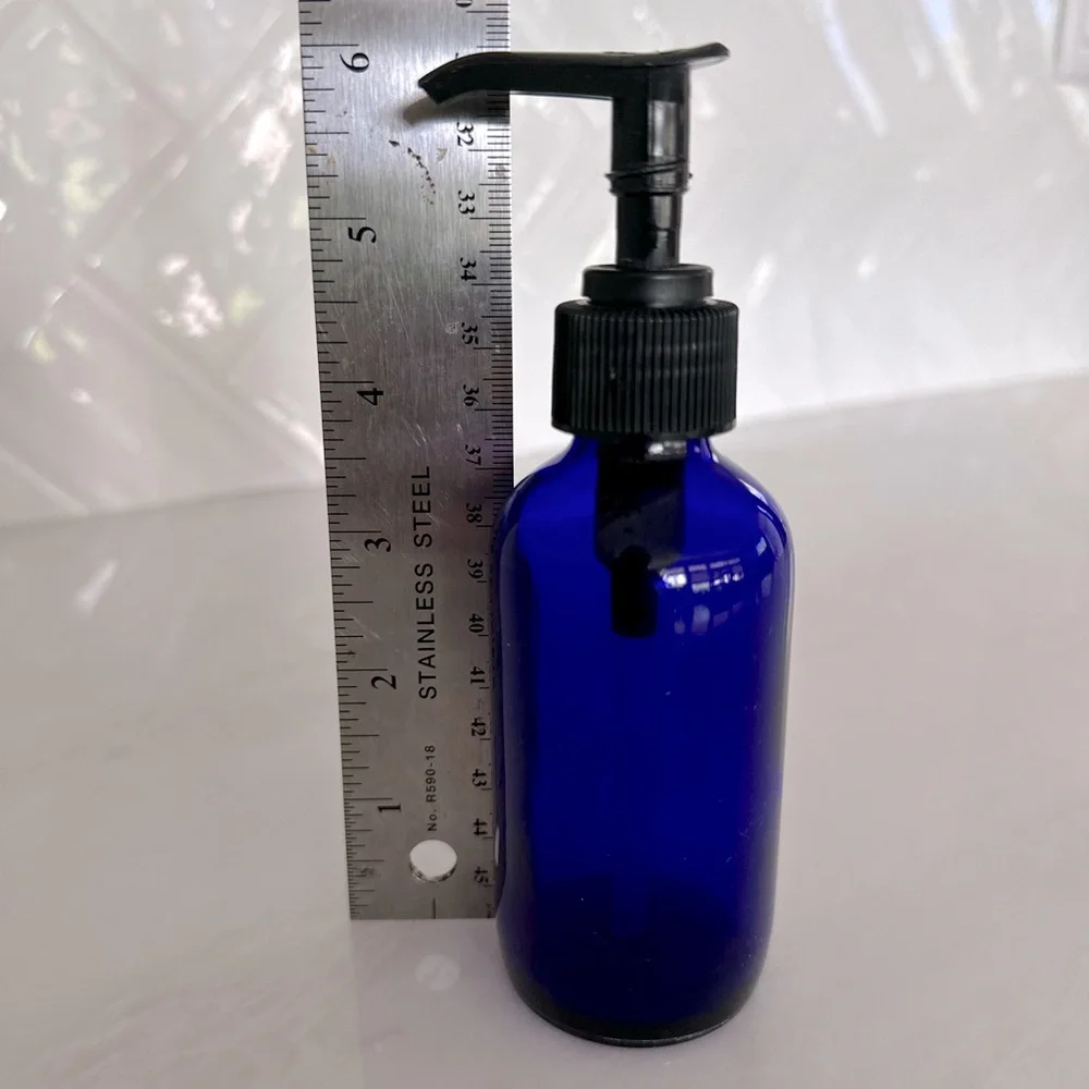 Cobalt blue glass lotion bottle